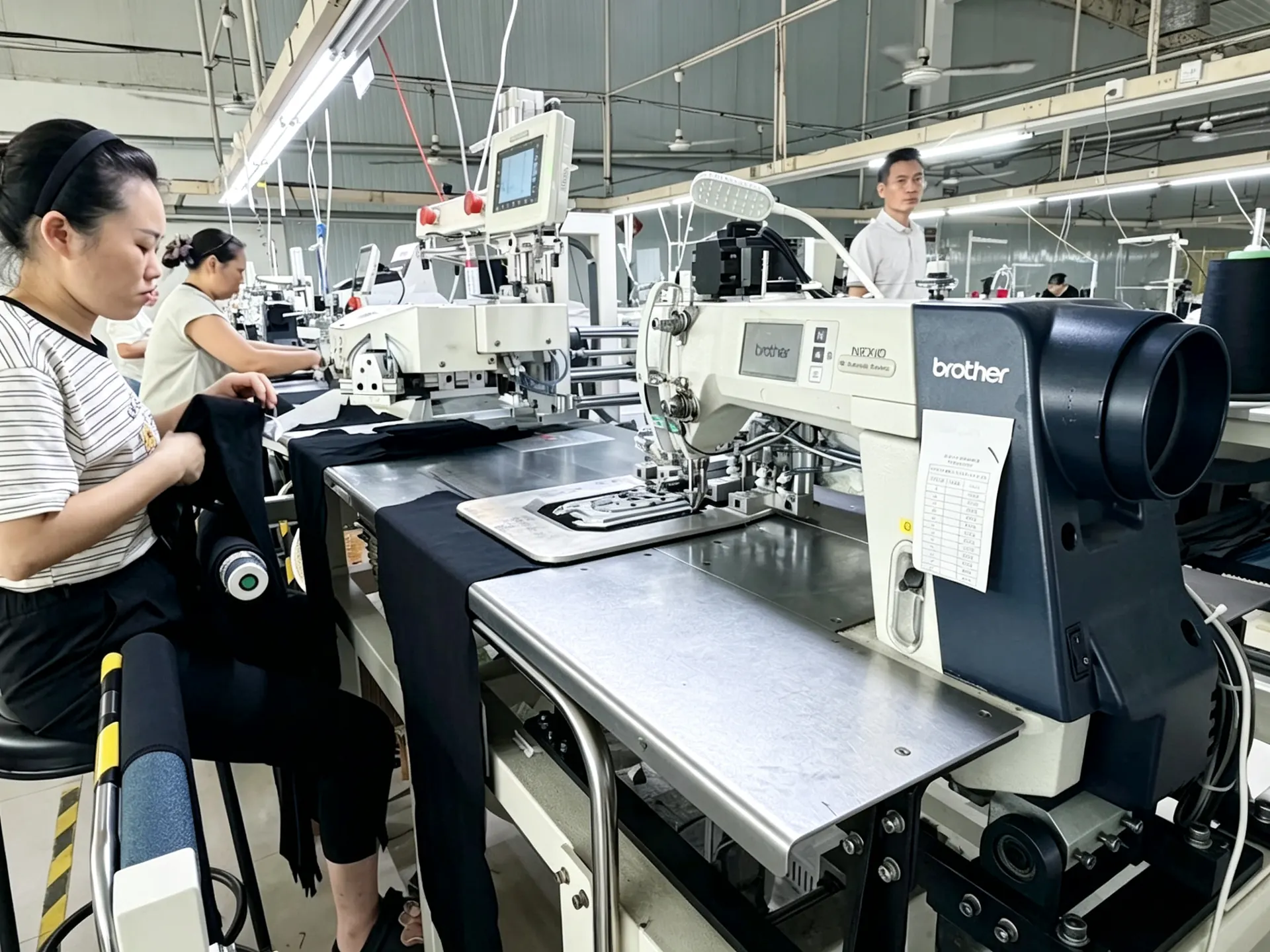 Sewing line at KEEP MOVING garment factory